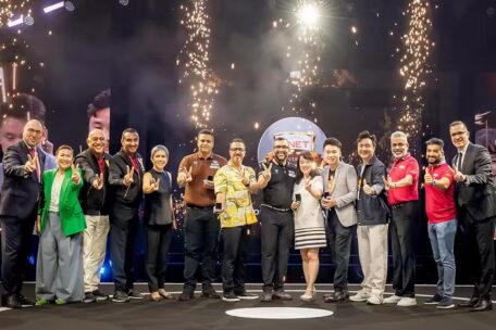 QNET success with chief on stage